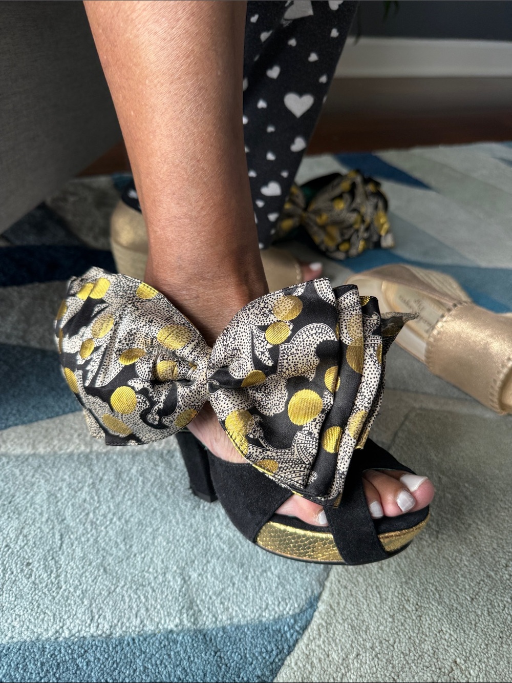 Black Suede Platform Heels with Decorative Gold-Patterned Bow